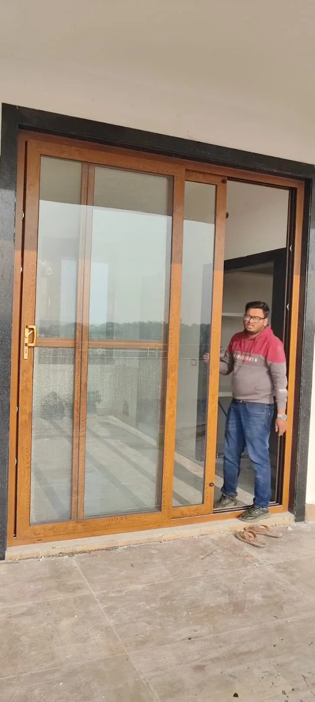 Wood-finish glazed door installation
